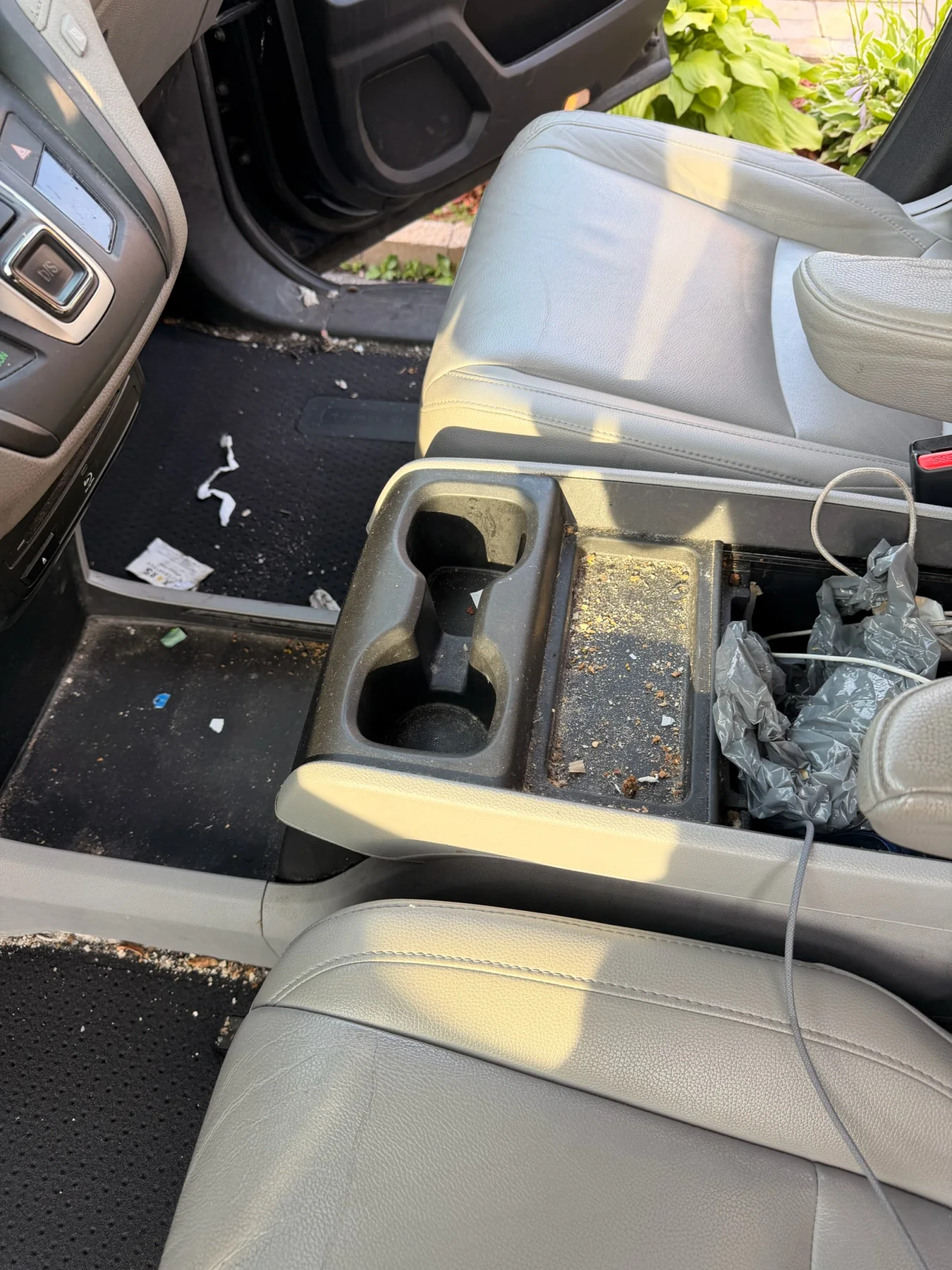 Vehicle centre console before Ancore interior detailing