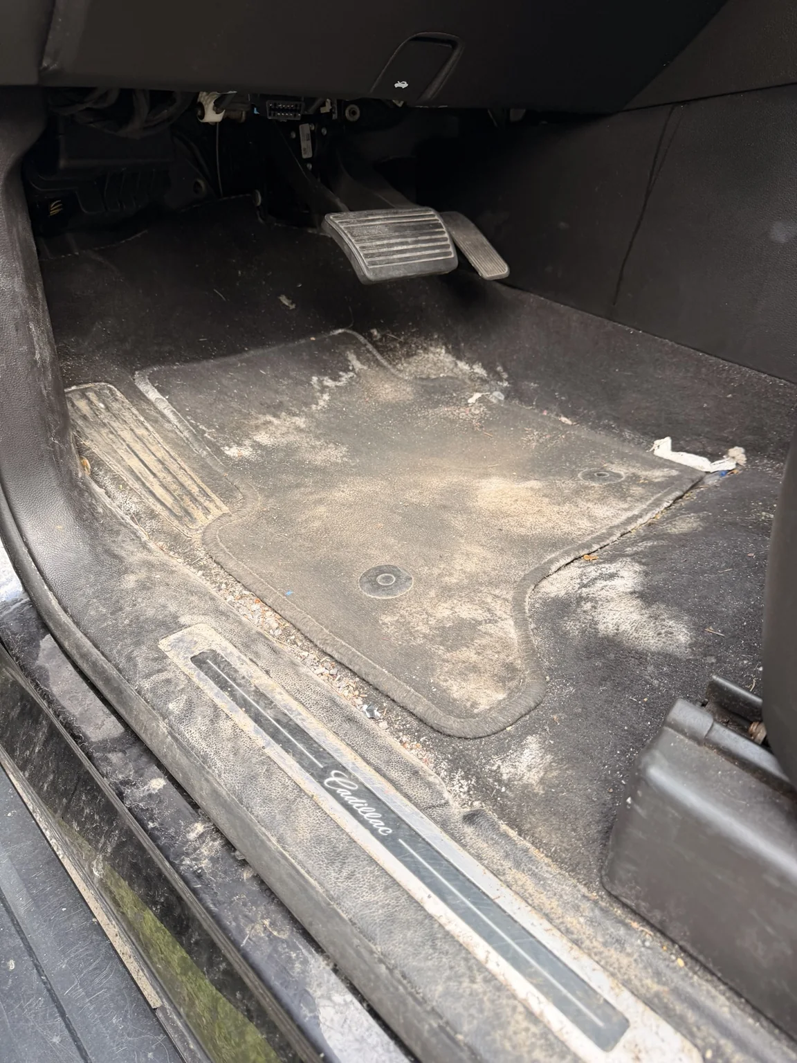 Cadillac driver footwell before Ancore detailing